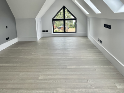 Premium wood flooring and oak stairs in Siena colour for high-end rental property in Hertfordshire